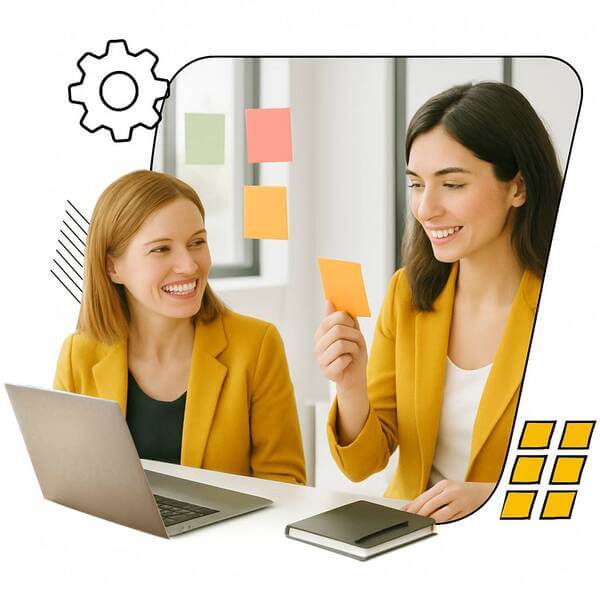 Sandstone - Leading PR Agency in the UAE Two women discussing in a PR agency