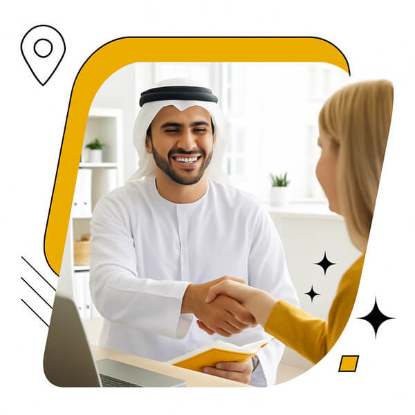 Sandstone - Your Trusted Dubai PR Experts An arab from UAE shaking hands with a woman displaying a partnership.
